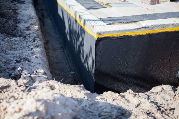 Professional Exterior Waterproofing technician working in Great River, NY